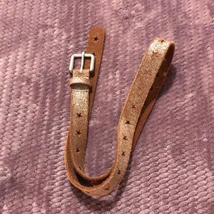 Brown and silver shine belt with star cut outs